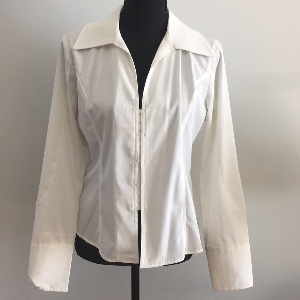 Long sleeved, front hook closure, dress shirt.